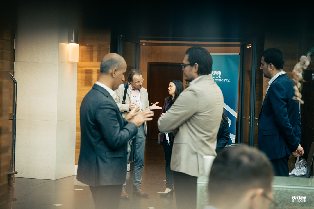 Delegates talking during a networking break